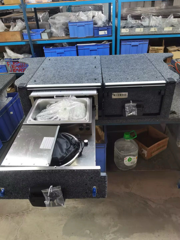Over landing drawer system -integrated kitchen for suv or jeep